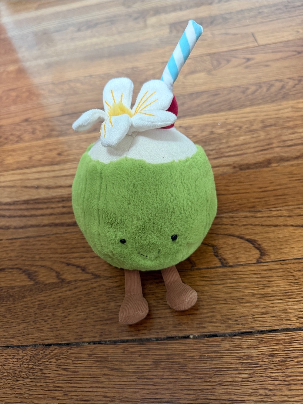 Jellycat Green Coconut Plush with Blue-Striped Straw and White Flower